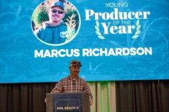 Marcus Richardson, the 2024 Young Producer of the Year at Soil Health U, accepts his award Jan. 17 in Salina, Kansas. (Journal photo by Kylene Scott.)